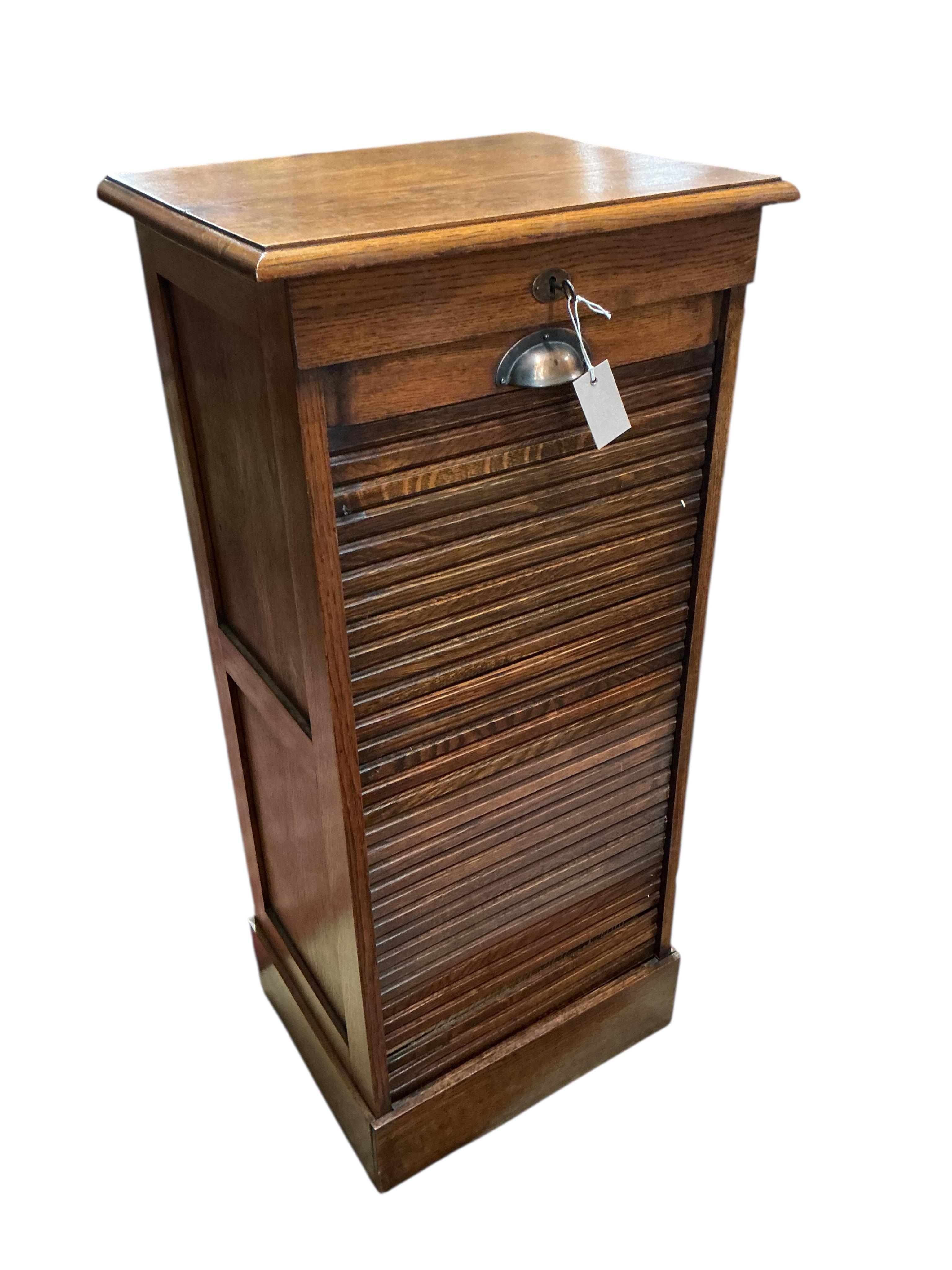 An early 20th century oak tambour filing cabinet, width 50cm, depth 39cm, height 111cm